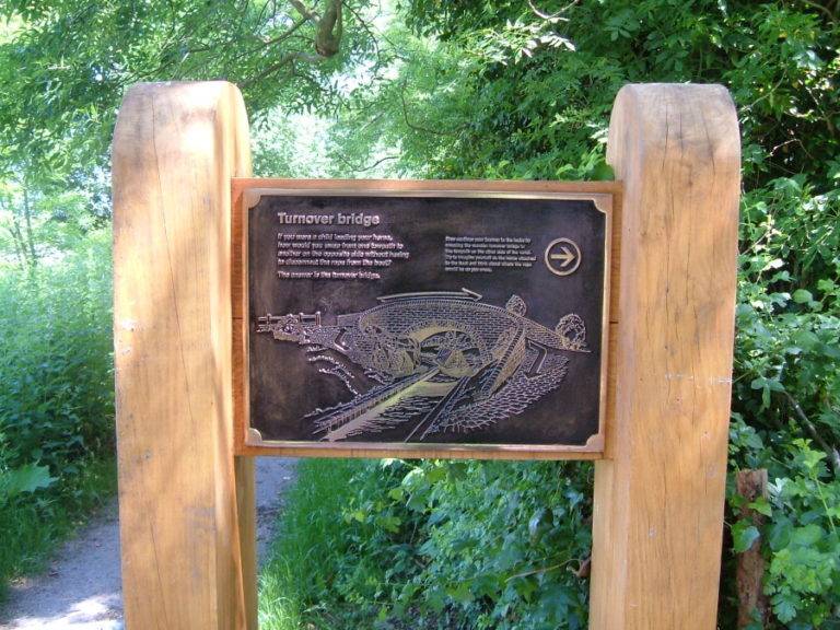 twin post sign with bronze plaque