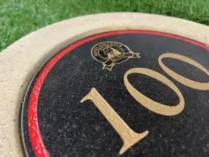 Nevill Golf Club – round granite mow over marker